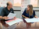 Puerto Rico Section Manager Oscar Resto, KP4RF (left) and Red Cross Regional Executive Director Lee Vanessa Feliciano during the signing of the renewed MoU. [Courtesy of Oscar Resto, KP4RF]

 